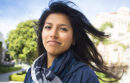 Latina student with hair blowing in the wind