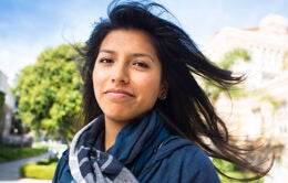 Latina student with hair blowing in the wind