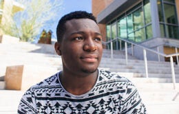 Man staring pensively into the distance