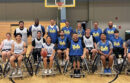 UCLA adaptive and instructional programs coordinator Michael Garafola, center, during a UCLA wheelchair basketball program.