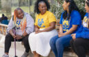 UC Riverside students chat in front of the Student Disability Resource Center.