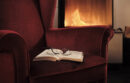 Cozy chair with book and glasses