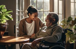 Granddaughter holding grandfather's hand