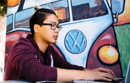 student working on a computer at UCSB