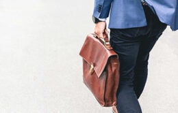 Man walking with a suitcase