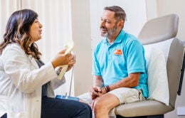 Doctor speaking with a man