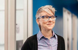 Smiling woman wearing glasses