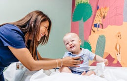 Nurse helping a child
