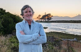 Kevin Culcasi by the Golden Gate Bridge at sunset.
