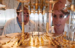 Researchers study a dilution refrigerator at the Center for Quantum Coherent Science at UC Berkeley.