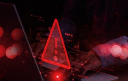 System hacked warning alert on laptop