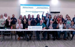 ANR staff and Pomo Indians celebrate the MOU signing