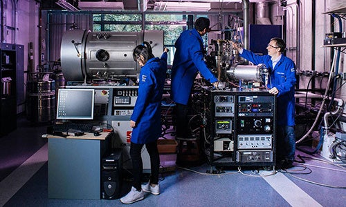 UC Riverside scientists working with large technology equipment