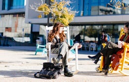 Two women sitting in rocking chairs at UC San Diego