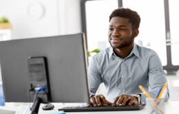 african american businessman with computer working at office