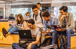 Group of UCLA students in the library