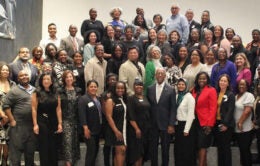 Large group of UCOP employees with President Drake