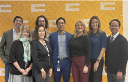 Group of standing smiling people