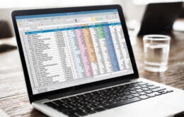 laptop computer displaying a spreadsheet