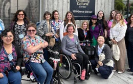 Group of people standing or sitting in wheelchairs together in front of the SF Disability Cultural CenterCredit: UC Berkeley