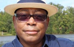 Melvin wearing a fun hat