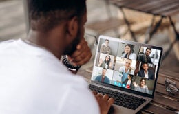 Man participating in a Zoom call