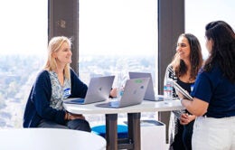 Entrepreneurs chatting at UC Berkeley's SkyDeck