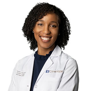 Veronica Jones headshot in medical coat