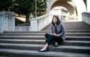 Woman sitting on stairs