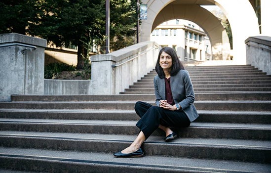 Woman sitting on stairs