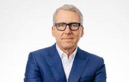 President Milliken wearing a serious expression