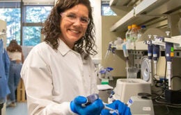 UC Santa Cruz professor Karen Miga working in a lab
