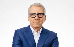 President Milliken wearing a serious expression