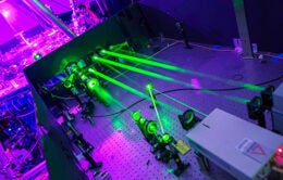 Lab bathed in purple and neon green lights