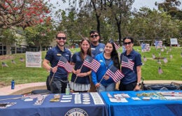 Group of people holding flags