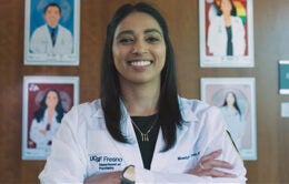 Dr. Monique Atwal in her doctor's coat