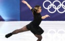 Alysa Liu skating with raised arms