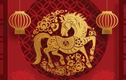 Golden horse against red background
