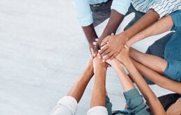 Teamwork, motivation and diversity hands stacked with mock up corporate marketing or advertising space. Group support, community or staff team building for project goal, solidarity and collaboration.