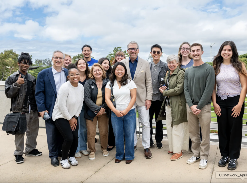 President Milliken w. UCSB students outside on campus