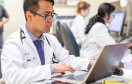 Clinical staff working on computers at the Santa Anna Family Health Clinic