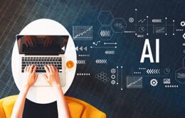 AI with person using a laptop on a white table