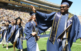 Berkeley grads walking to collect their diplomas