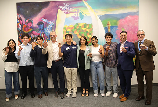 President Milliken, students, Chancellor Muñoz make bobcat claws