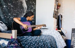 UC Merced student in her dorm room