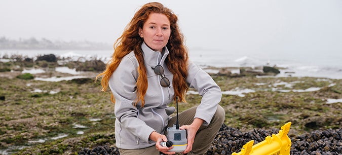 A UC Santa Barbara graduate student conducts research at Coal Oil Point Reserve. Credit: Elena Zhukova/University of California