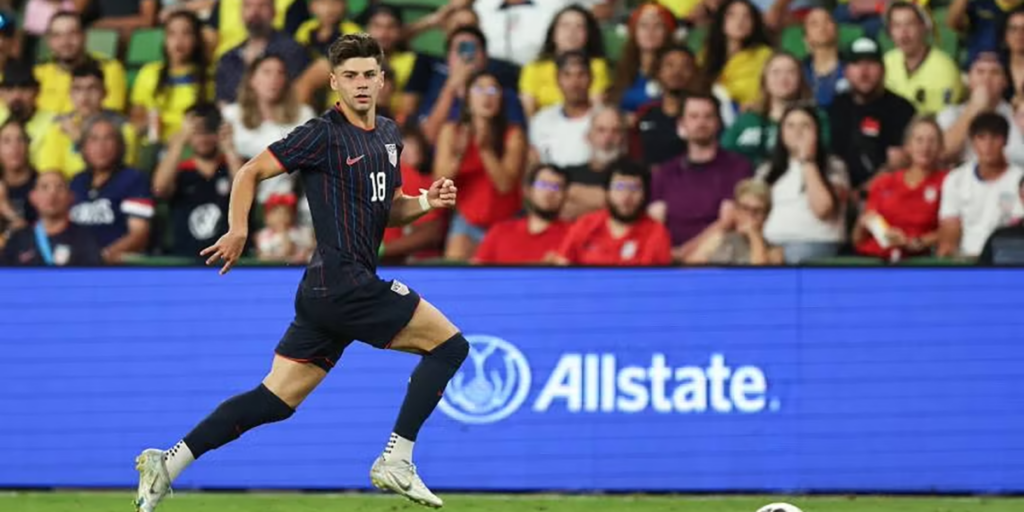 Max Arfsten of the United States drives a ball