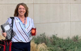 Wendy Hunter Barker in front of the Rady School of Management at UC San Diego