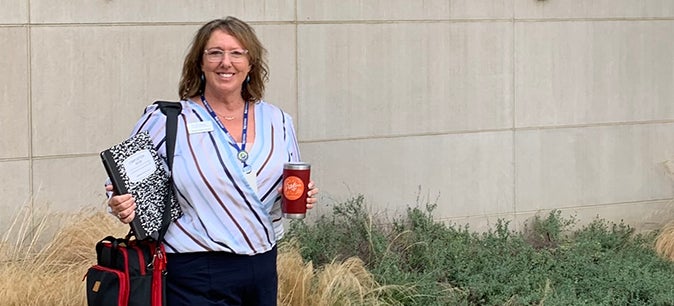 Wendy Hunter Barker in front of the Rady School of Management at UC San Diego