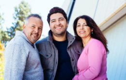 Adult son with two parents